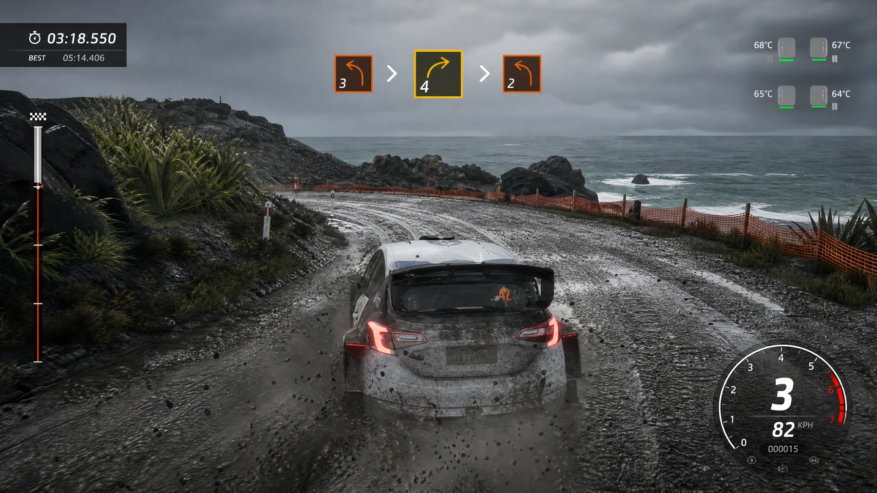 Rally car attacks a wet coastal gravel hairpin with pace notes, tyre temperatures and stage timer visible.